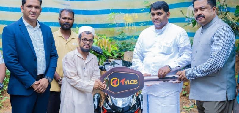 MA Yusuff Ali gifts electric scooter to disabled youth